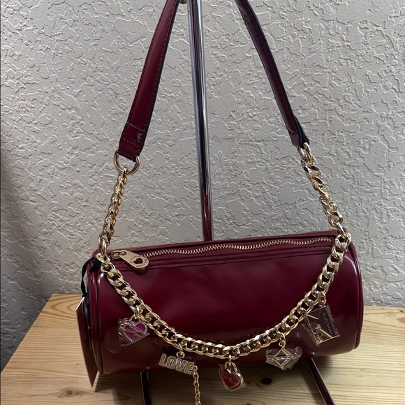 Juicy Couture Handbags - Juicy Couture Burgundy Shoulder Bag with Gold Chain